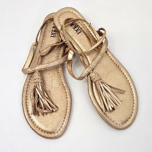 Reba Gold Leather Fringe Flat Thong Sandals w Braided Wrap-around Ankle Strap